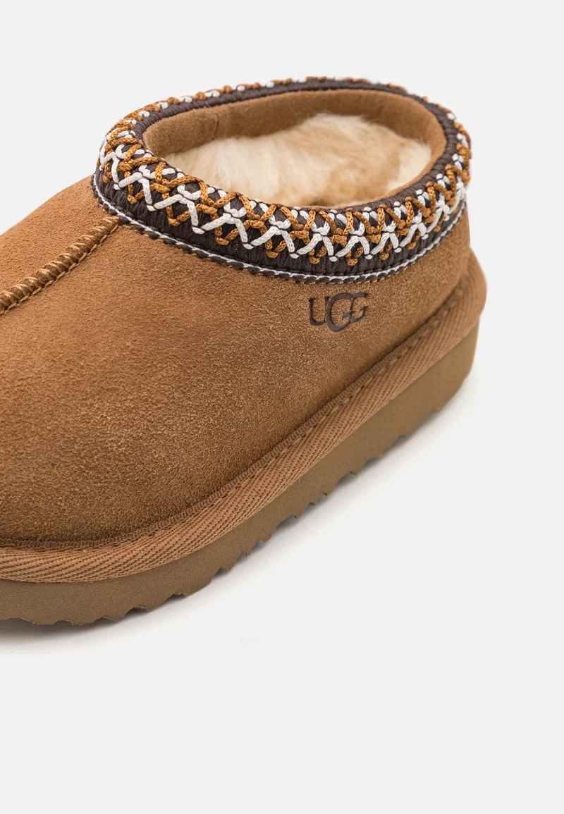 Close-up of the collar and lining of UGG Tasman II slipper.